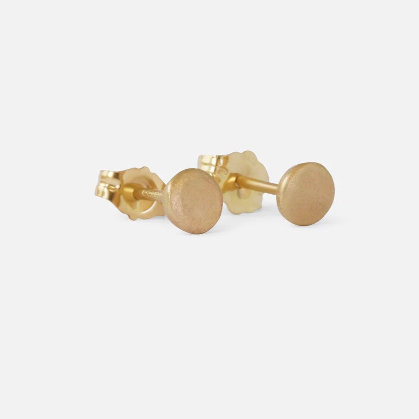 Complete your look with these versatile and timeless DOT /STUD EARRINGS. With their classic design and easy-to-wear style, these earrings are a must-have accessory for any occasion.  4.52mm Round Stud Style Earrings 14k Yellow Gold Satin Finish