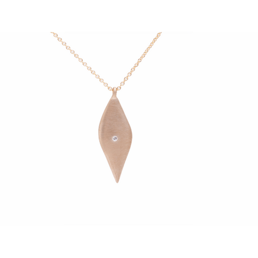 Enhance your jewelry collection with this elegant drop leaf necklace. The versatile design and sparkling diamond accent make it a perfect accessory for any occasion. Add a touch of sophistication to your look with this exquisite piece.