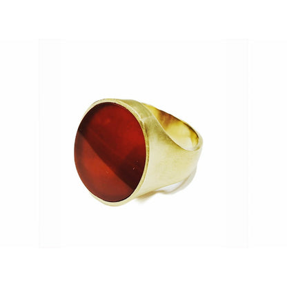 Indulge in the timeless elegance of our Regal Carnelian signet ring. Crafted with an exquisite design and featuring a genuine carnelian stone, this accessory exudes sophistication and style. Elevate your look and make a statement with this stunning piece of jewelry.