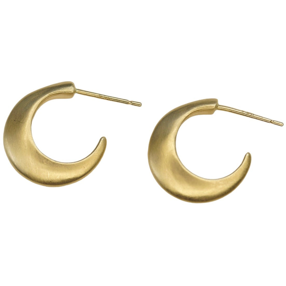 Step up your earring game with our Small Half Moon Hoops. With their versatile design, these hoops are perfect for any occasion. Easy to wear and a classic style. 14k Yellow Gold Satin Finish HxW: 14.04mm x 3.37mm